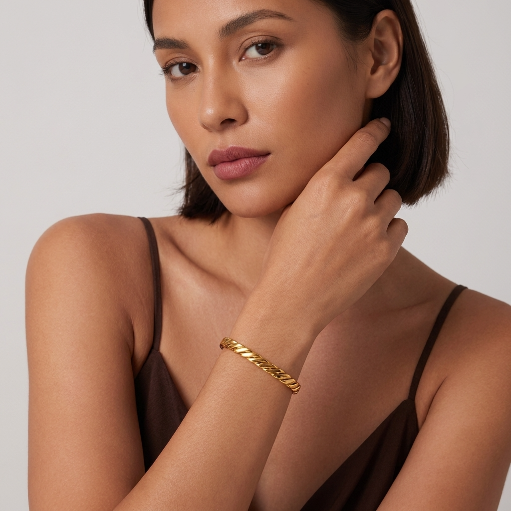 Emma Twist Bold Gold Bangle