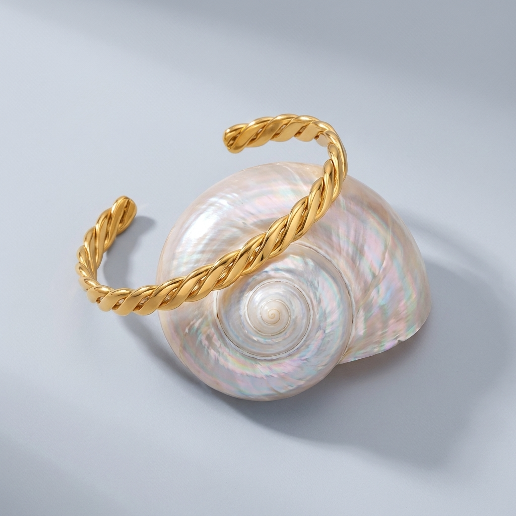 Emma Twist Bold Gold Bangle
