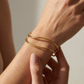 Aurélie Wave Gold Bangle